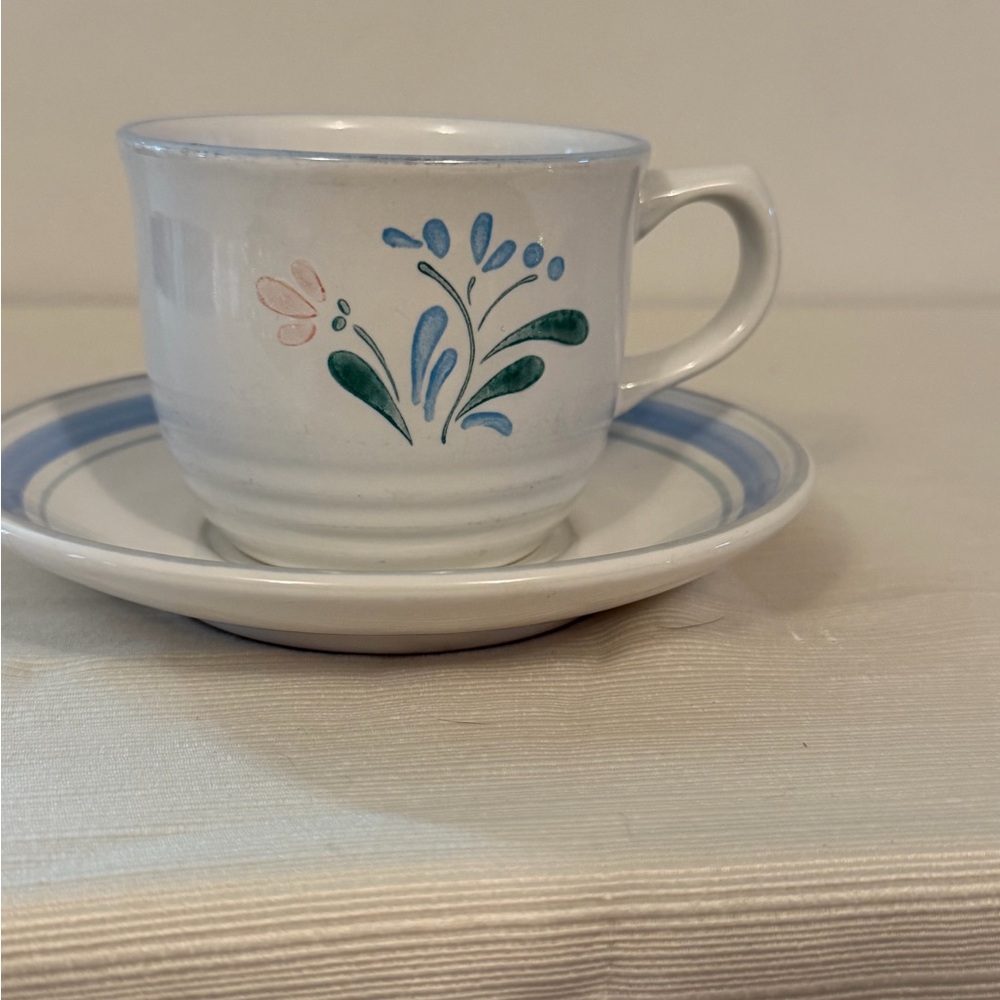 1980’s Vintage teacup/flatcup and saucer set.  Blue, pink, and green floral